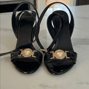Versace Black Heels with Gold Medallion